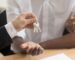 solicitor giving couple keys