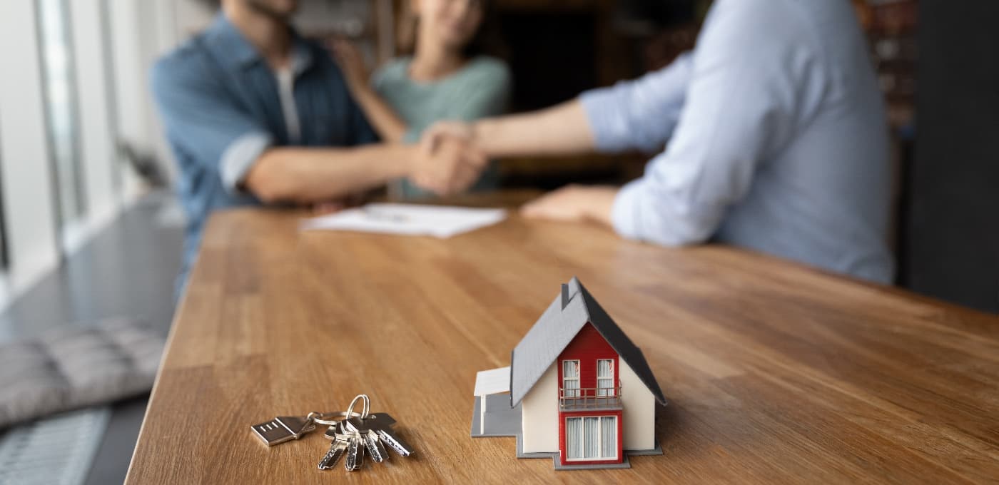 solicitor talking to couple regarding property