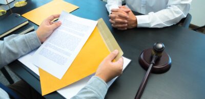 solicitor discussing documents with client