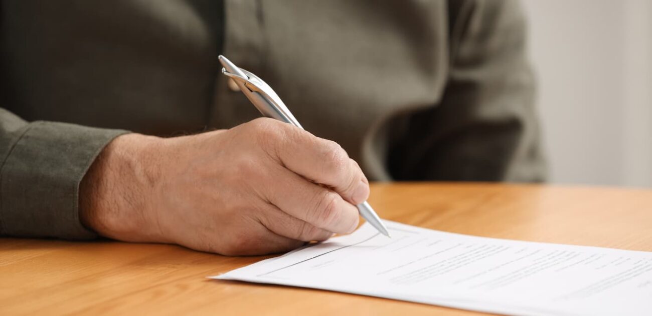 older guy writing a will